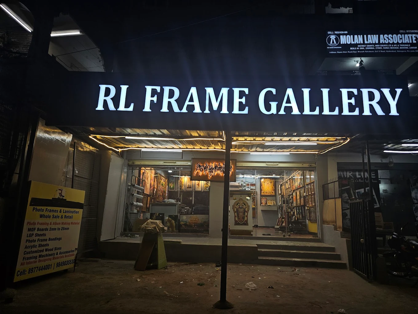 RL Frame Gallery store exterior at night